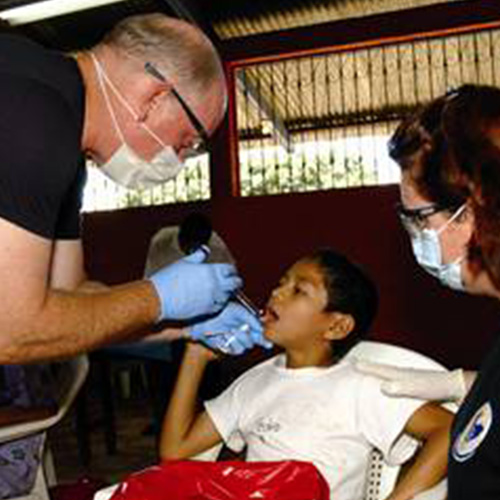 Dr. treating a young child.